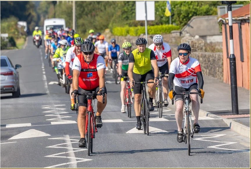 Cyclists representing Irish electrical companies at Dash of the Derg 2024 event.